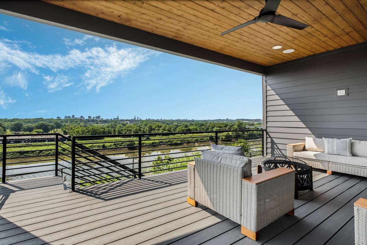 Step outside to take in the Cumberland River, Ted Rhodes Golf Course, and downtown - a rare trifecta of views from your private terrace.
