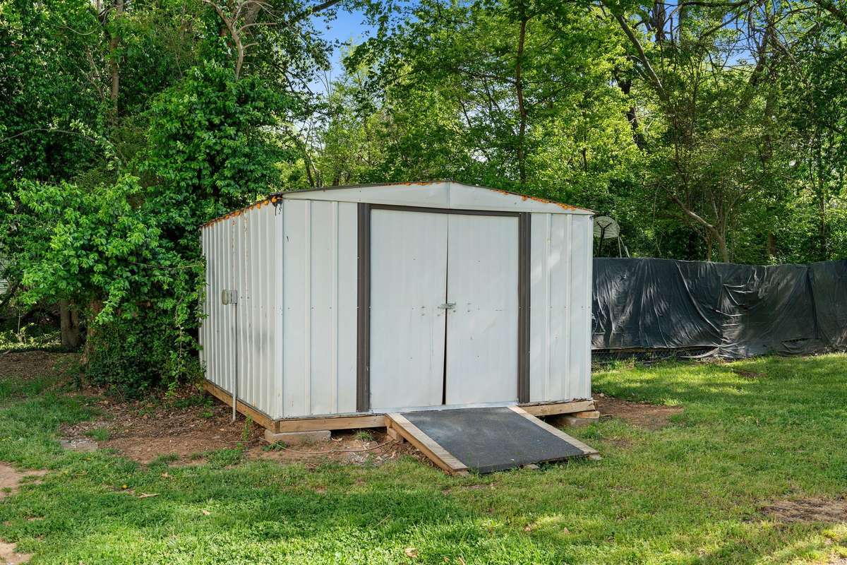 Additional storage shed stays with the property!