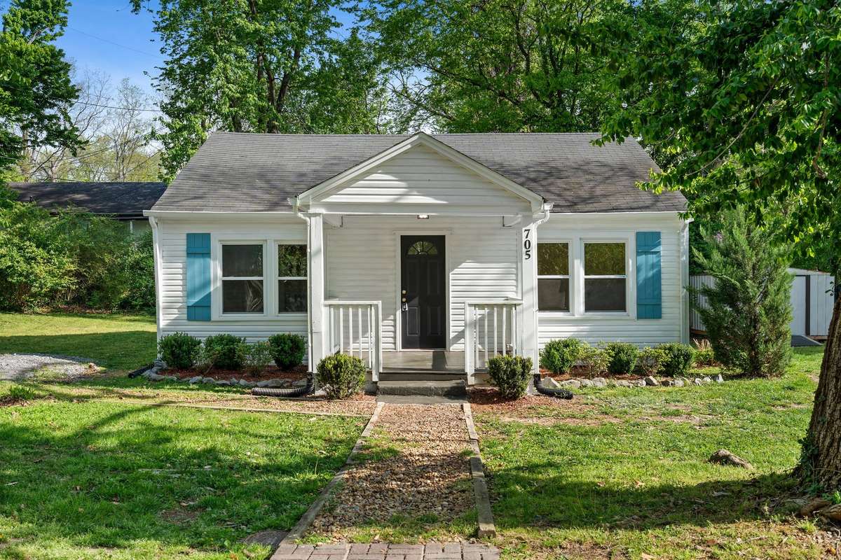 Adorable blue shutters add instant curb appeal!