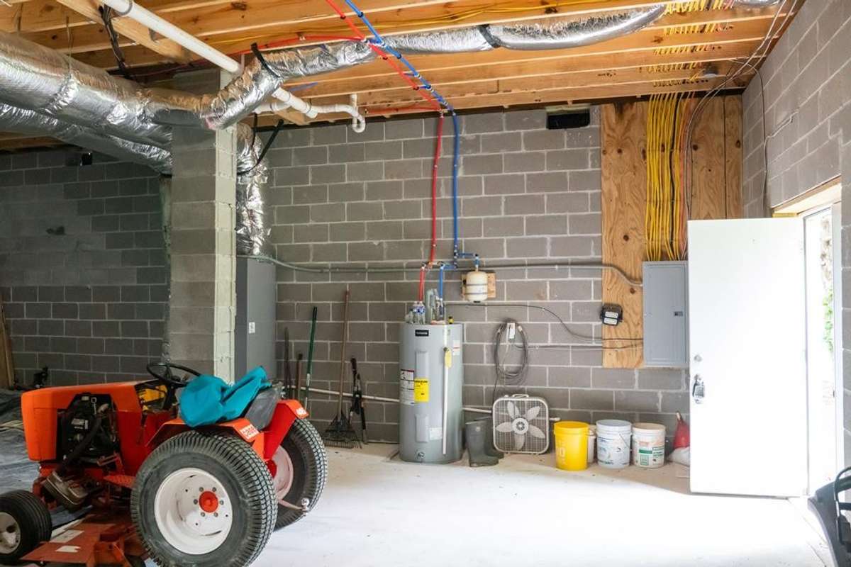 Tall ceiling height in storage area with concrete