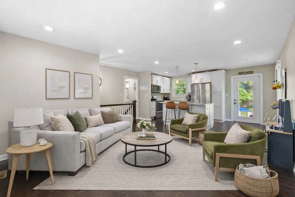 This is the same space as the previous picture, only now used as a living room. Same upstairs space, two different options. (this is virtually staged)