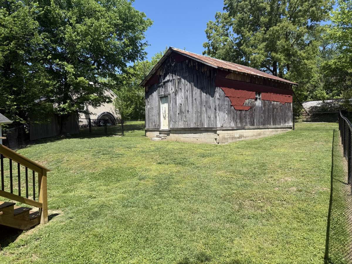 20 x 27 Barn / Storage Building with drive-thru doors off of Railroad Street.