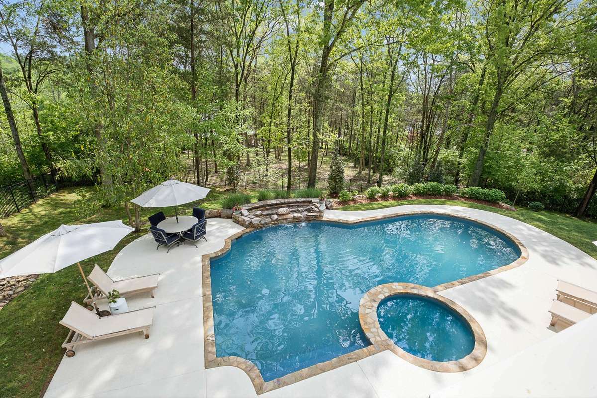 Backyard oasis features a gorgeous heated, saltwater POOL AND SPA completely renovated (2026) including new coping, tile, surface, heaters and Sundeck pool surround. Just in time for summer!