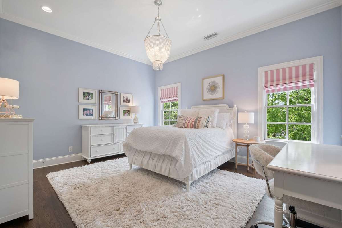 Bedroom #4 is another generously sized bedroom with a walk-in closet and en-suite bathroom.