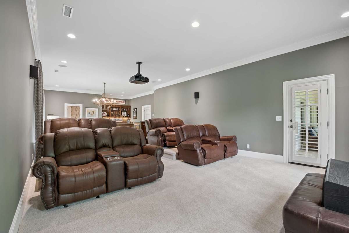 8 movie chairs, a new projector and speakers enhance the experience.