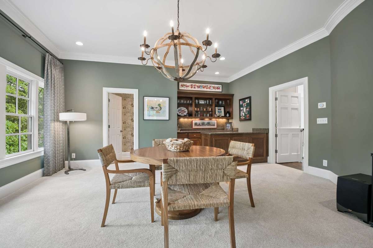 Plenty of space to host mahjong or poker nights! Equipped with a wet bar and a half bath for your convenience.