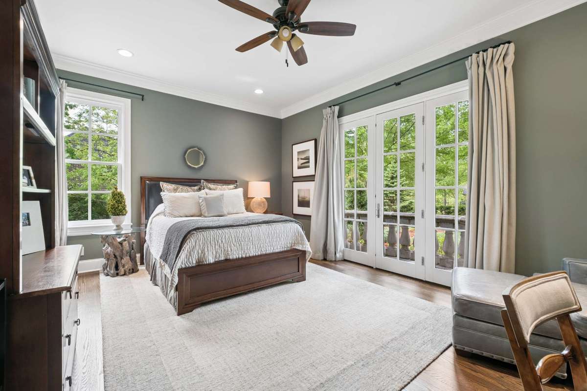 Bedroom #2 is located on the main level, is generous in size and features an en-suite bathroom and walk-in closet.