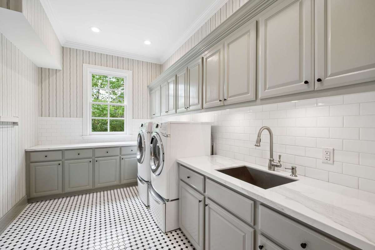 Doing laundry will be a pleasure in this cheerful, renovated Laundry Room.