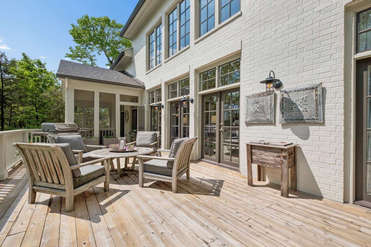 Located off of the Living Room and Screened Porch, the deck overlooks the pool and offers another beautiful outdoor setting.