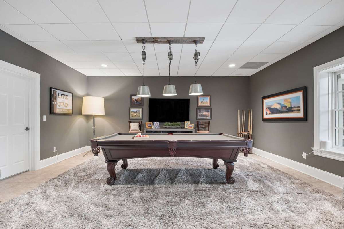 Now set up as a Game Room, this could also be a Bonus Room, a second Office or a Guest Room~so many options to fit your needs!