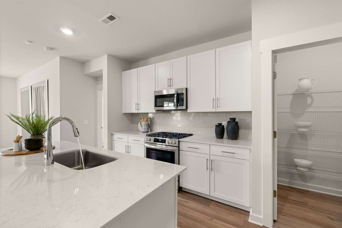 Photo of model, features and selections may not represent community selections *Avery Trace Community will have Electric cook top*