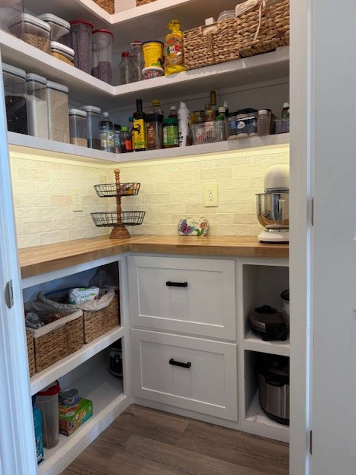 Beautiful custom made pantry done by the seller.