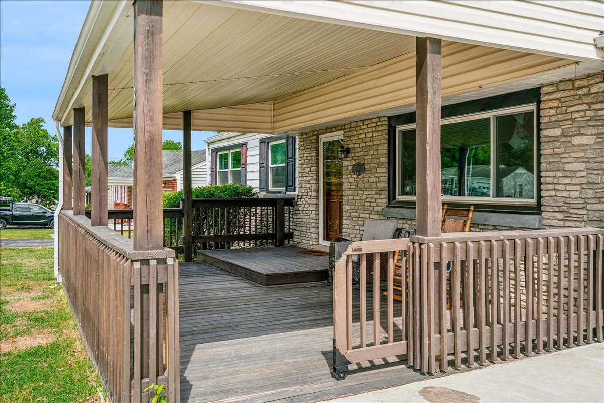 Covered front porch with sliding gate