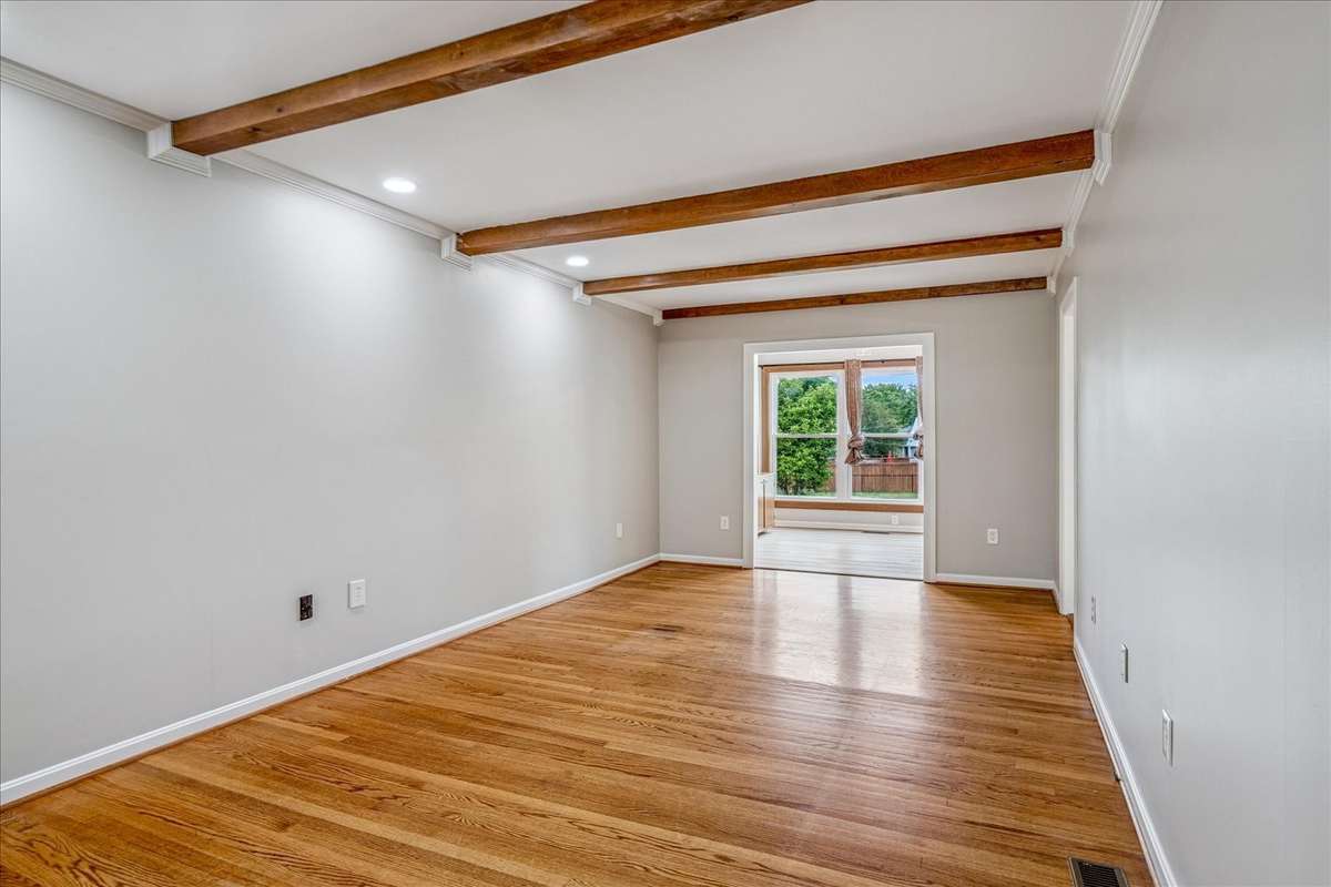 Den with exposed beams