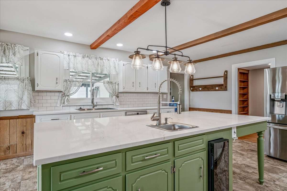 Quartz counters and a convenient island sink