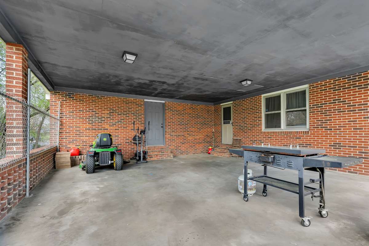 Storage area accessible from the carport.