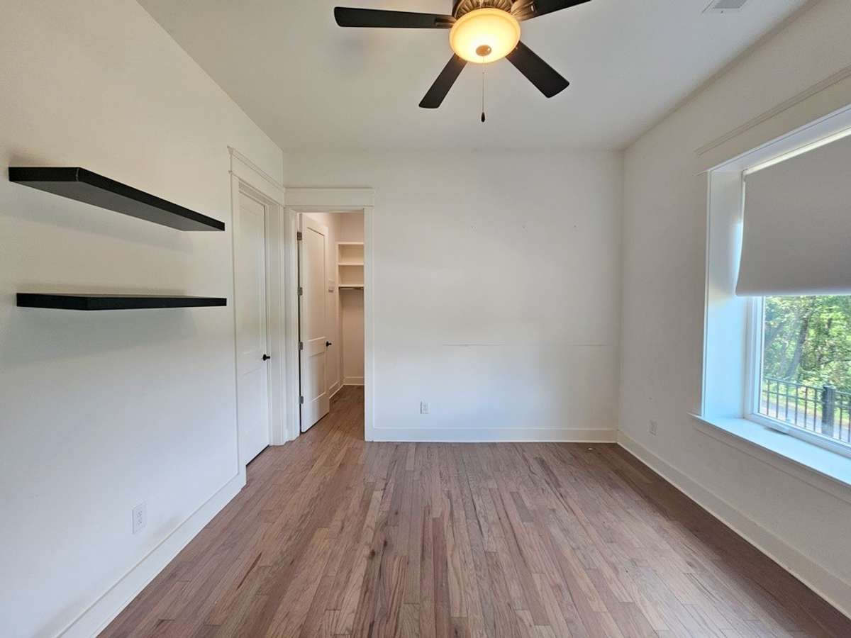 The 2nd bedroom is on the lower level off the entertainment area with walk-in closet and access to the full bath on the left.