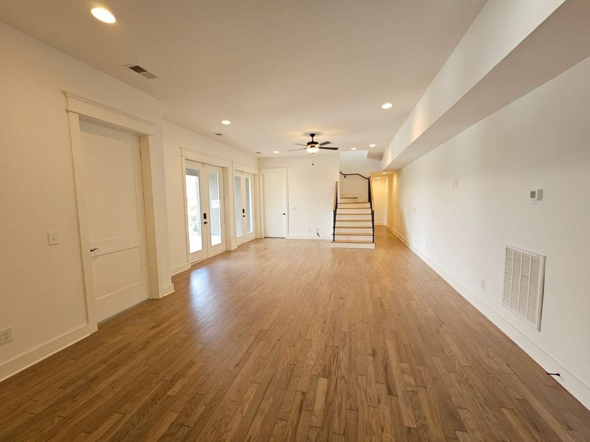 The downstairs entertainment area has so many possibilities. With the butler's pantry this could be an ideal In-Law suite.