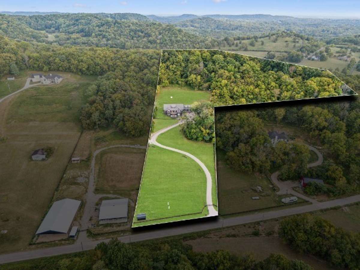 This aerial view shows the property lines of the 6.91 acres that has trails for walking and ATV rides.