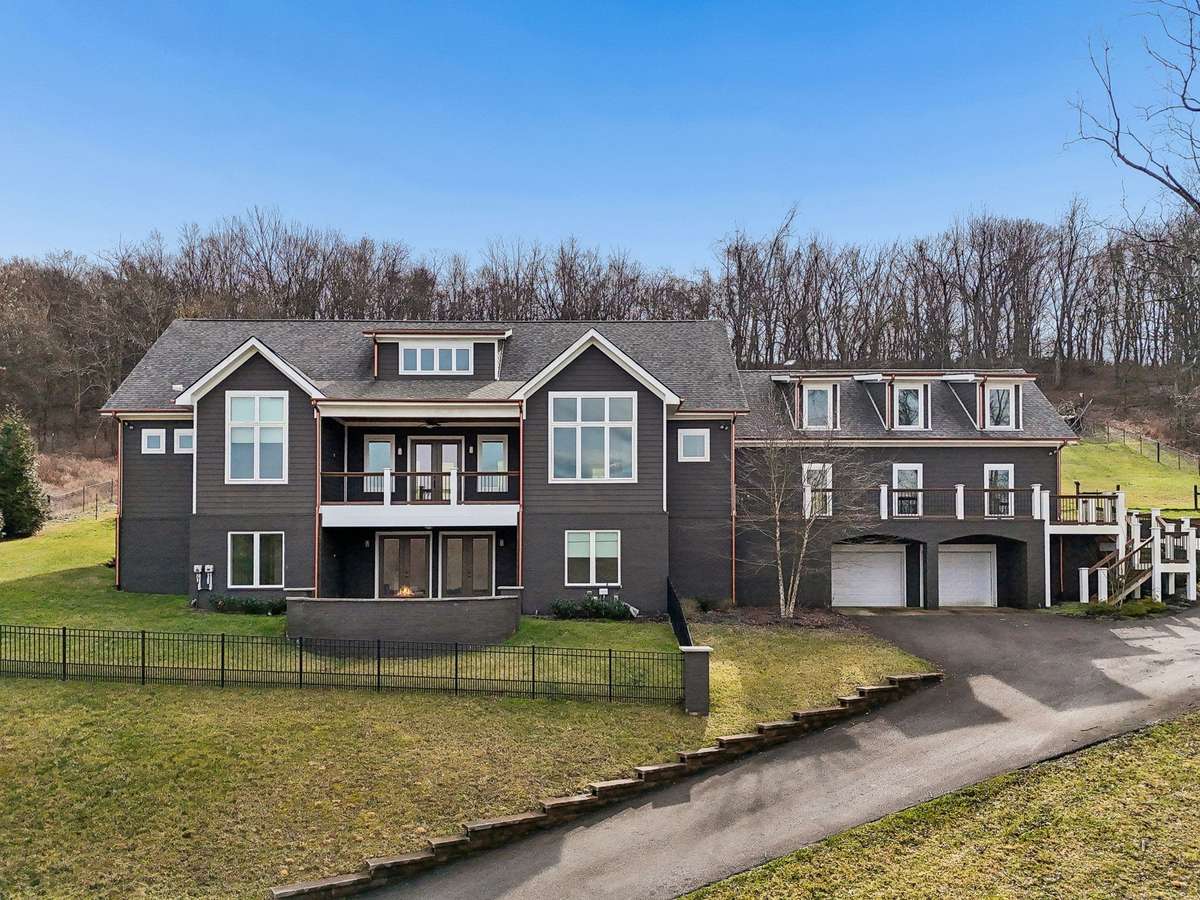 6720 Lane Rd in College Grove nestled atop a hillside with mountain views.