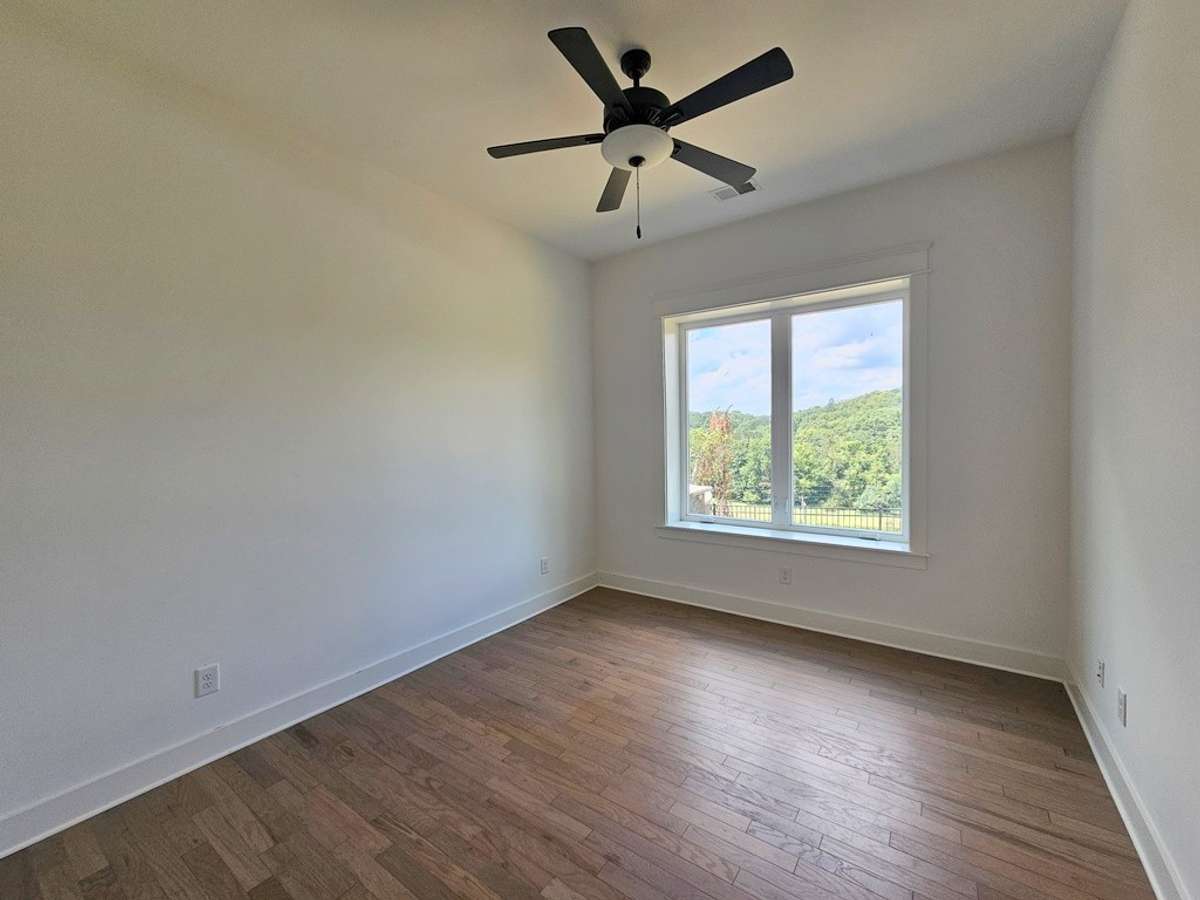 The 3rd bedroom is located down the hall from the hobby room with a large walk-in closet and access to the 3rd bathroom.