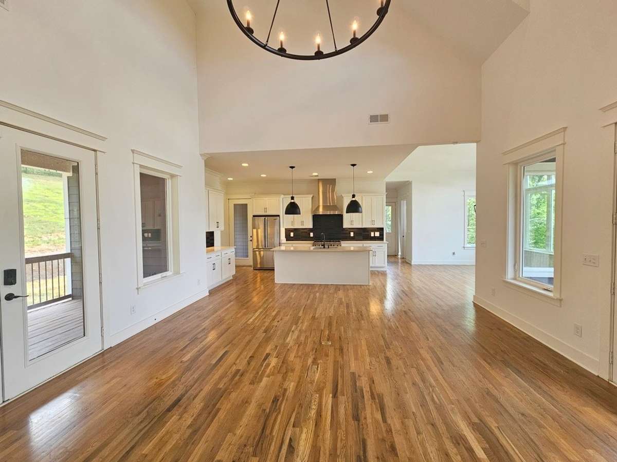 Another view of the living room into the kitchen and dining area.
