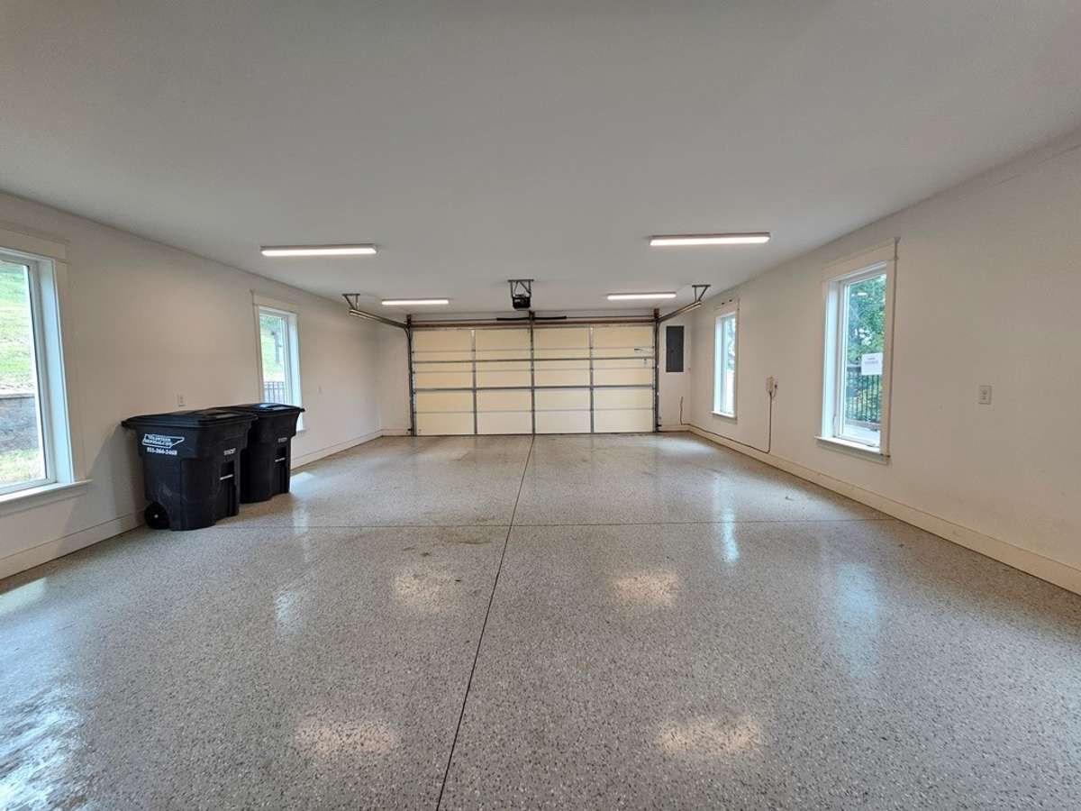 Main level garage. Well lit, deep and wide for additional storage.