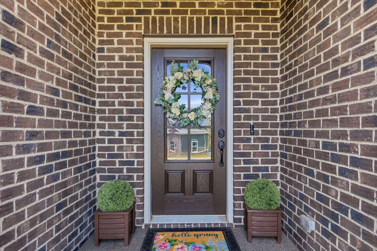 The covered front porch even has outlets!
