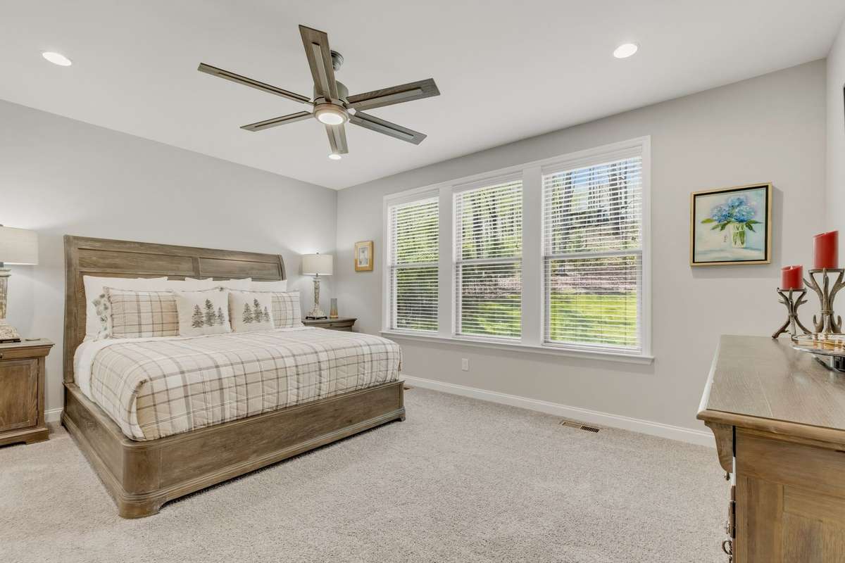 Everywhere you look is spacious and well lit!  The master bedroom suite is private and cozy.