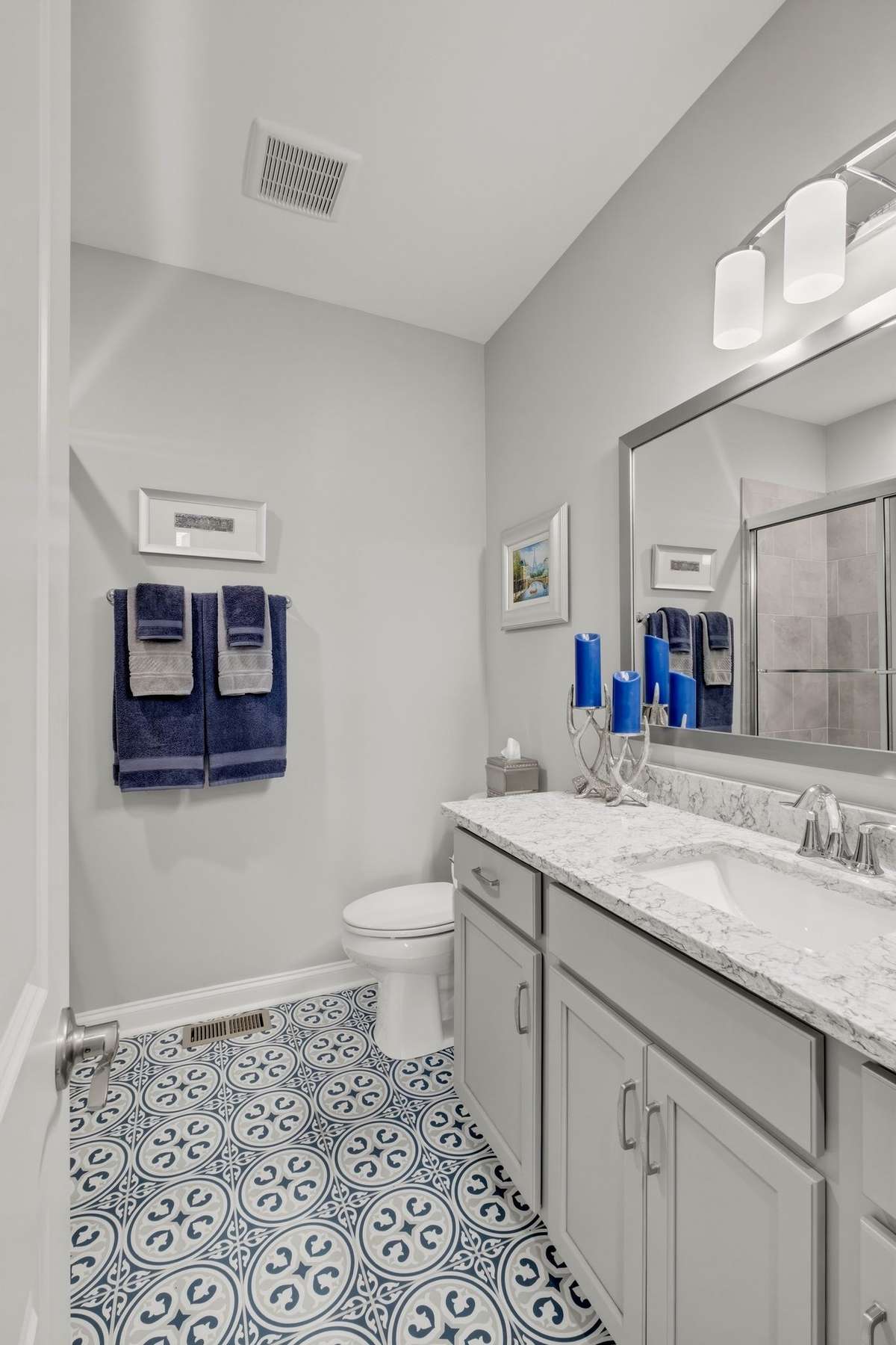The second full bath downstairs is a real showstopper!  The elegant tile really sets it off.