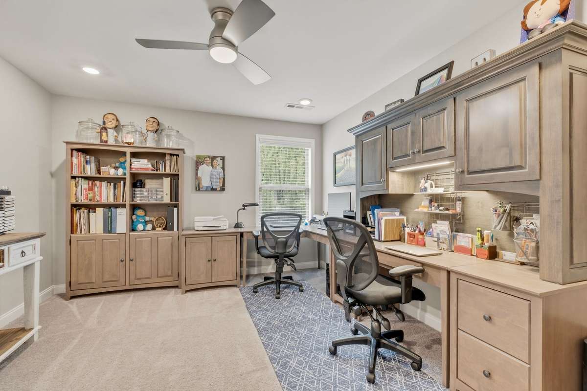 The fourth bedroom is upstairs (currently being used for office & crafts).  So much space and light...and storage!