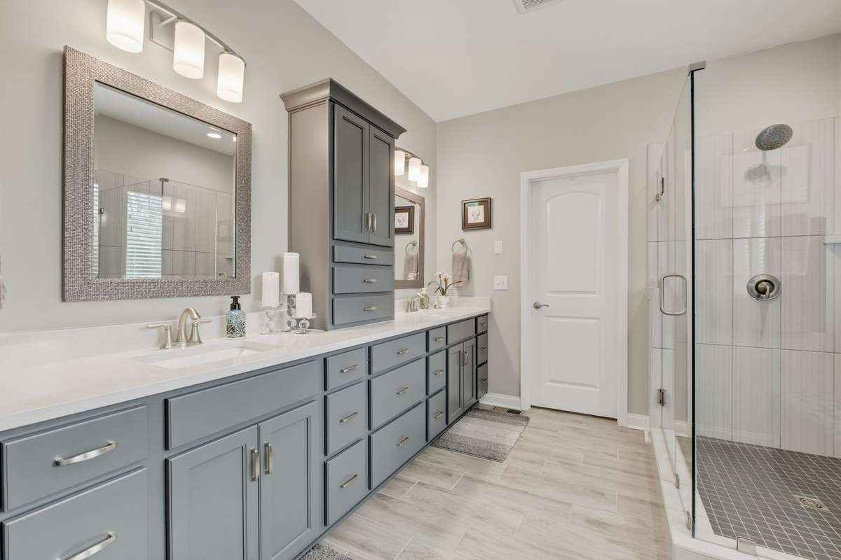 What a beauty!  Double vanities and extra storage in your incredible master bath.