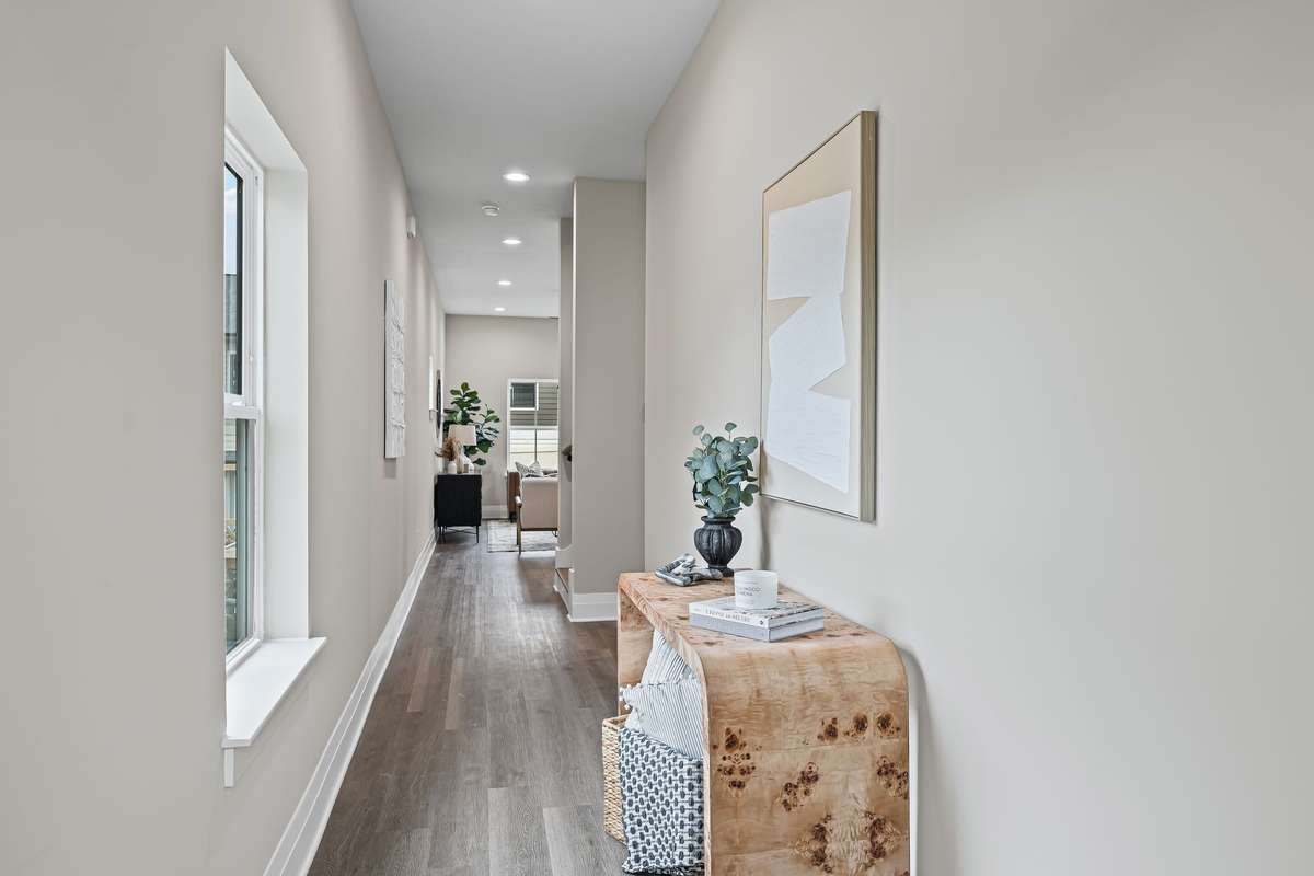 Hallway to Open Living Room/Kitchen Area.