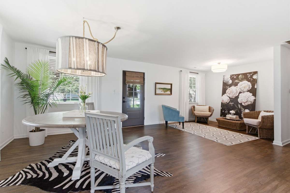Newly refinished hardwood floors and fresh paint throughout