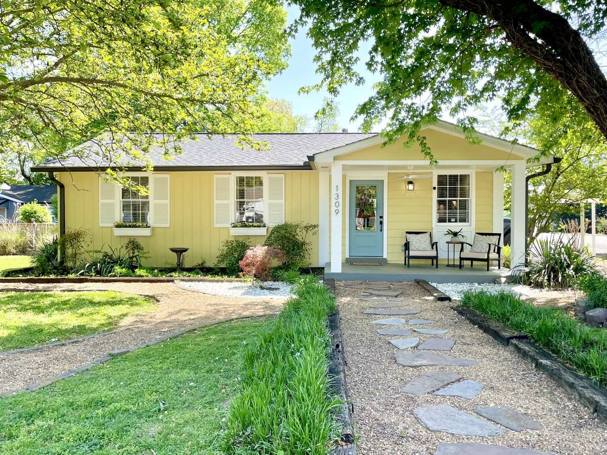 Sunny cottage on corner lot with mature trees