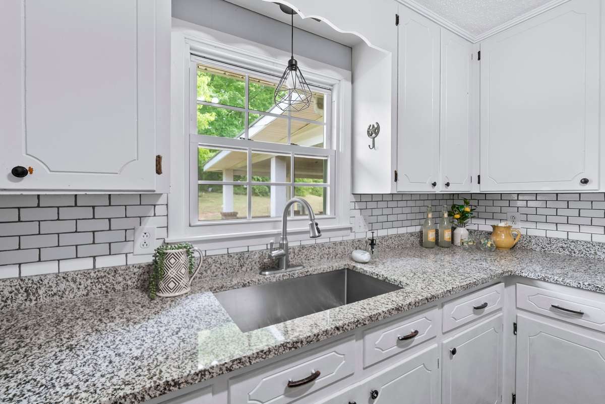Enjoy nature's views while cooking in your remodeled kitchen.
