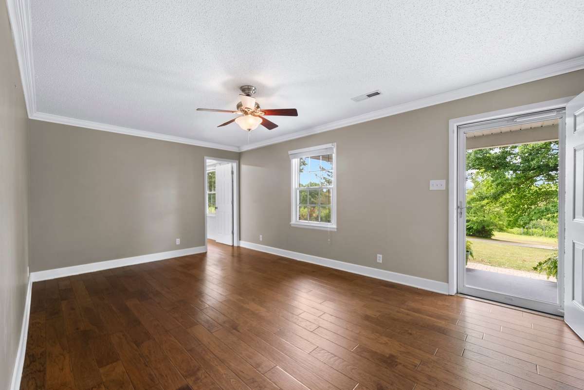 Living room or optional 4th bedroom. The views are stunning. Country living is the best!