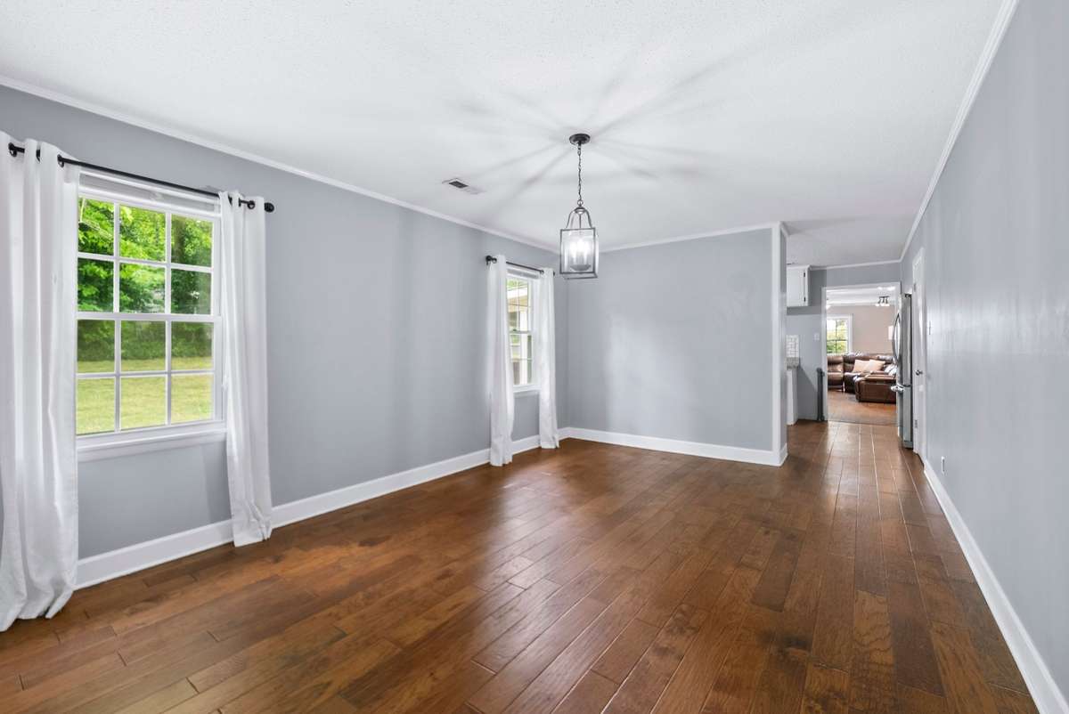 Formal dining room with plenty of space to host. The views are breath taking.