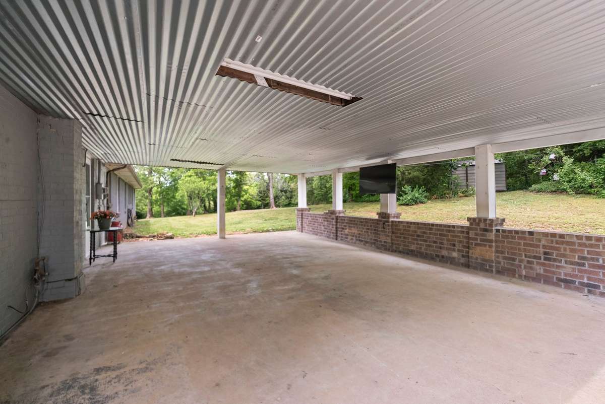 Two vehicle carport