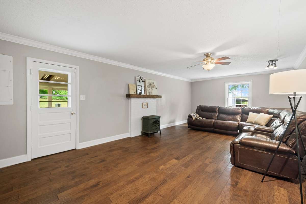 Cozy by the gas fireplace in the bonus room.