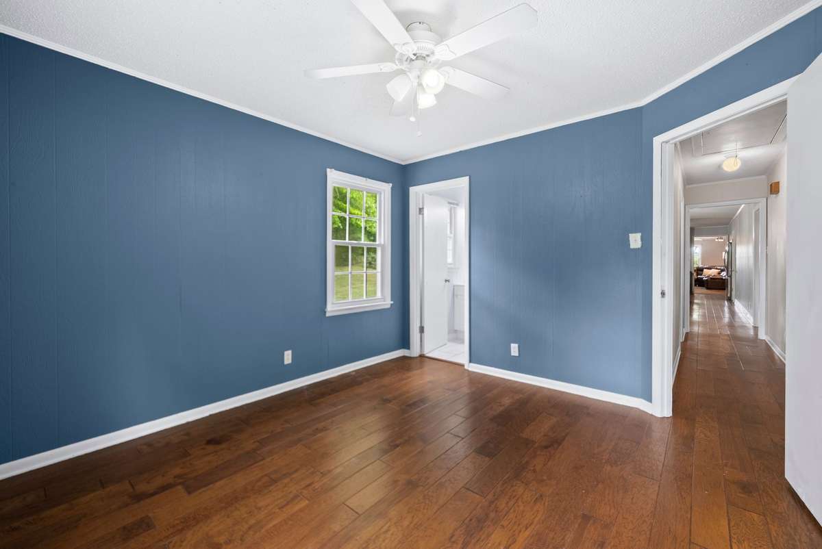 Primary bedroom with in suite bathroom.