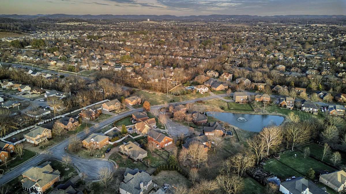 Showing off neighborhood and the ponds