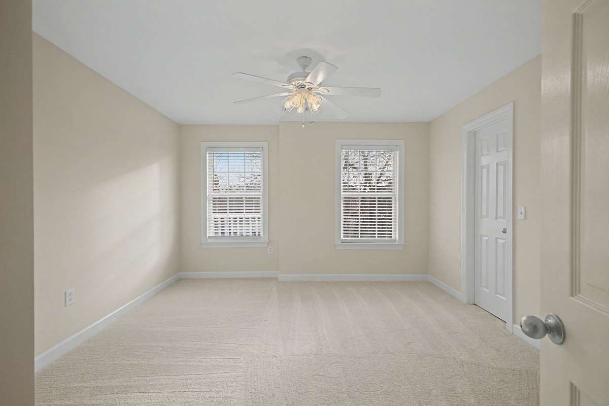 Guest Bedroom with large walk-in closet, new flooring, paint