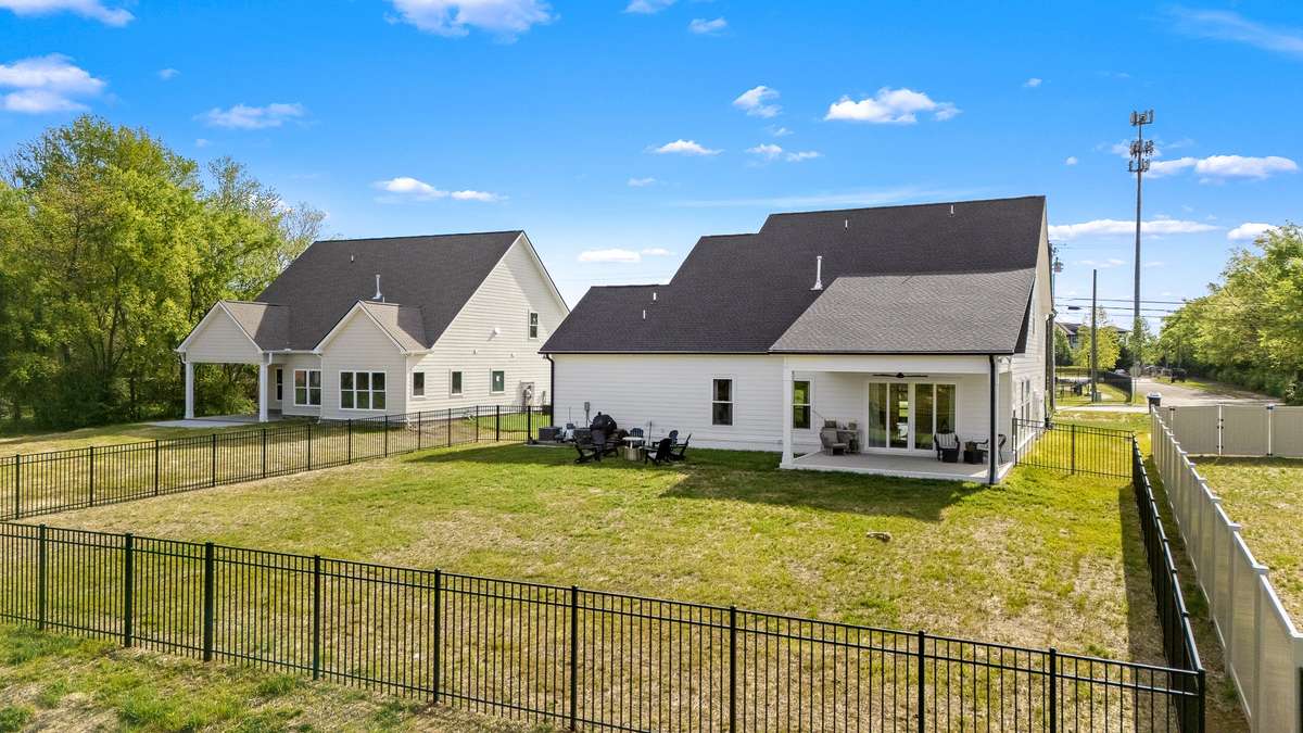 520 Gresham Lane - Exterior | Large Covered Porch & New Black Aluminum Fence