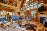 Living room with vaulted ceilings and gas fireplace