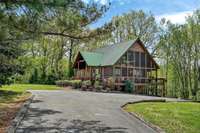 Multiple outdoor living areas, including this fabulous screened in porch