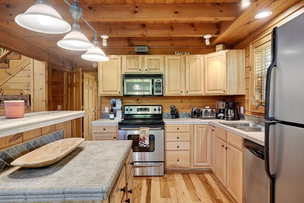 Lots of cabinet space and breakfast bar