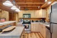 Lots of cabinet space and breakfast bar