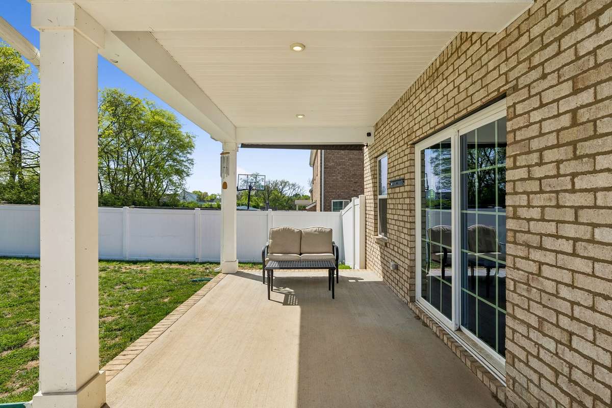 The covered patio provides some nice shade and protection from the weather.