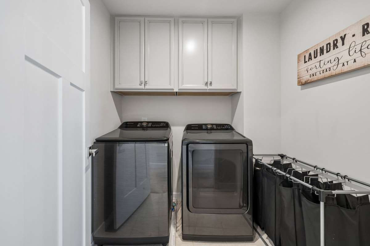 The laundry room is conveniently located on the 2nd floor with the majority of the bedrooms. No need to carry baskets of clothes up and down stairs.